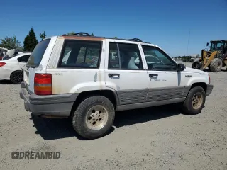 1993 Jeep Grand Cherokee Laredo с VIN 1J4GZ58S2PC654248, выставлен на аукционе Copart как лот 61259735 с пробегом 251 360 миль миль и Списание • Salvage title. История ставок и продаж доступна на DreamBid. Изображение 3.