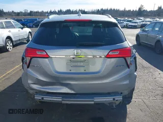 2021 Honda HR-V EX with VIN 3CZRU6H59MM749892, listed as a IAAI auction lot 41550074 with 61,590 mi miles. Bid and sale history available at carsss.com. Image 6.
