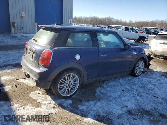 2014 MINI Hardtop S with VIN WMWXM7C51ET986340, listed as a Copart auction lot 42390825 with 71,558 mi miles and Salvage Title. Bid and sale history available at DreamBid. Image 3.