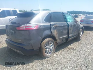 2023 Ford Edge SEL z VIN 2FMPK4J97PBA31506, wystawiony jako IAAI lot #42071208 z przebiegiem 50 458 mil mil oraz . Historia ofert i sprzedaży dostępna na DreamBid. Obrazek 4.