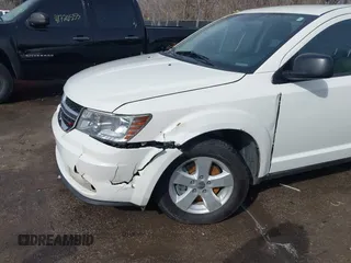 2013 Dodge Journey SE with VIN 3C4PDCAB3DT536714, listed as a IAAI auction lot 41699265 with 160,000 mi miles. Bid and sale history available at carsss.com. Image 6.