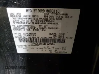2014 Ford Flex SEL z VIN 2FMGK5C80EBD20556, wystawiony jako Copart lot #60169395 z przebiegiem 172 047 mil mil oraz Czysty tytuł • Clean title. Historia ofert i sprzedaży dostępna na DreamBid. Obrazek 13.