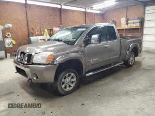 2007 Nissan Titan SE with VIN 1N6BA06BX7N236468, listed as a Copart auction lot 61549035 with 103,686 mi miles and Salvage title. Bid and sale history available at DreamBid. Image 1.