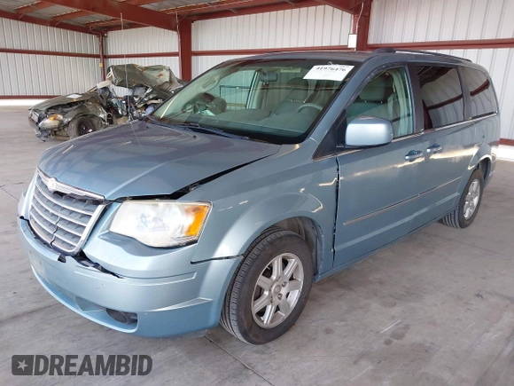 2010 Chrysler Town & Country Touring z VIN 2A4RR5D10AR500903, wystawiony jako IAAI lot #41976476 z przebiegiem 219 230 mil mil oraz . Historia ofert i sprzedaży dostępna na DreamBid. Obrazek 2.