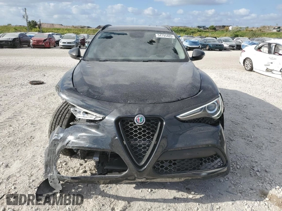 2019 Alfa Romeo Stelvio z VIN ZASPAJAN7K7C61221, wystawiony jako Copart lot #54795485 z przebiegiem 46 377 mil mil oraz Nie do naprawy. Historia ofert i sprzedaży dostępna na DreamBid. Obrazek 5.