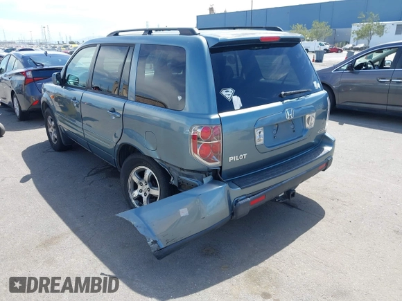 2007 Honda Pilot EX with VIN 2HKYF18447H520522, listed as a IAAI auction lot 42018937 with 128,401 mi miles. Bid and sale history available at carsss.com. Image 6.