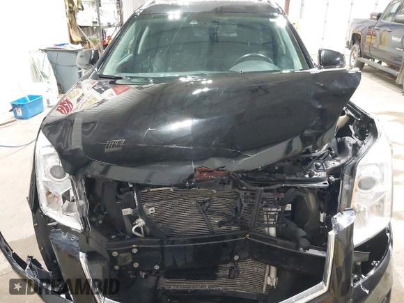 2016 Cadillac SRX Luxury Collection with VIN 3GYFNEE35GS514080, listed as a IAAI auction lot 42583744 with 88,935 mi miles and . Bid and sale history available at DreamBid. Image 12.