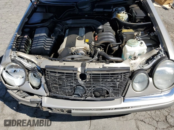 1997 Mercedes-Benz E-Class with VIN WDBJF55F4VJ032270, listed as a Copart auction lot 48010725 with 191,091 mi miles and Salvage Title. Bid and sale history available at carsss.com. Image 12.