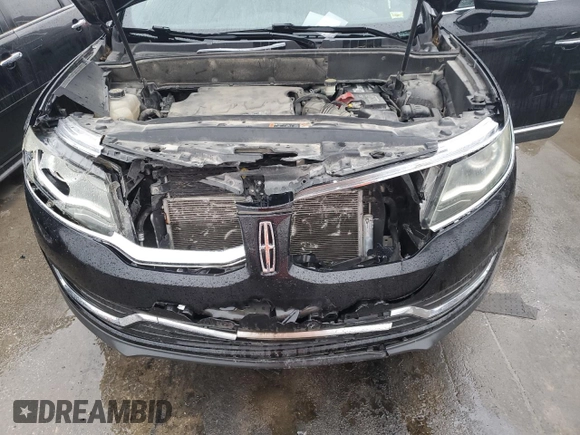 2016 Lincoln MKX Select with VIN 2LMTJ6KR6GBL50573, listed as a Copart auction lot 82331484 with 129,121 mi miles and Salvage Title. Bid and sale history available at carsss.com. Image 13.