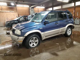 2002 Suzuki Grand Vitara JLX z VIN JS3TD62V524160739, wystawiony jako Copart lot #88416995 z przebiegiem 98 820 mil mil oraz Szkoda całkowita • Salvage title. Historia ofert i sprzedaży dostępna na DreamBid. Obrazek 1.