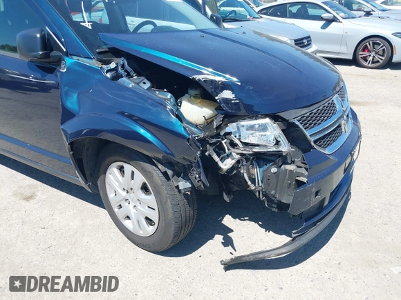 2014 Dodge Journey SE z VIN 3C4PDCAB3ET209912, wystawiony jako IAAI lot #42854043 z przebiegiem 84 624 mil mil oraz . Historia ofert i sprzedaży dostępna na DreamBid. Obrazek 6.