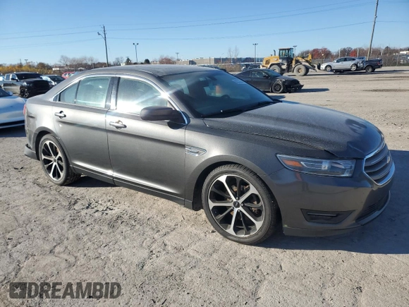 2015 Ford Taurus SEL with VIN 1FAHP2E99FG193966, listed as a Copart auction lot 82333044 with Not Provided miles and Salvage Title. Bid and sale history available at DreamBid. Image 4.