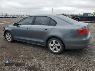 2014 Volkswagen Jetta Comfortline with VIN 3VWDL7AJ2EM399732, listed as a Copart auction lot 55946795 with 198,723 mi miles and Clean title. Bid and sale history available at DreamBid. Image 2.