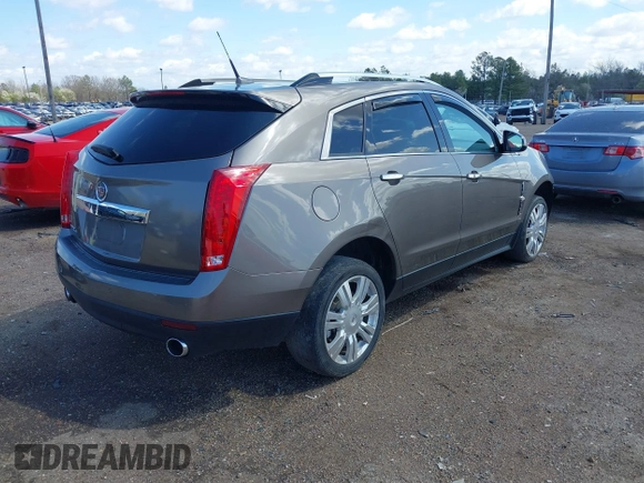 2011 Cadillac SRX Luxury Collection with VIN 3GYFNDEY6BS677576, listed as a IAAI auction lot 41769774 with 106,097 mi miles. Bid and sale history available at carsss.com. Image 4.