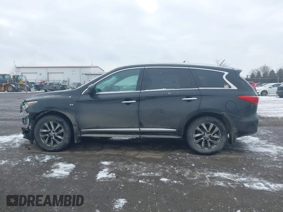 2015 Infiniti QX60 z VIN 5N1AL0MM7FC524175, wystawiony jako IAAI lot #41417720 z przebiegiem 124 622 mil mil oraz . Historia ofert i sprzedaży dostępna na DreamBid. Obrazek 14.