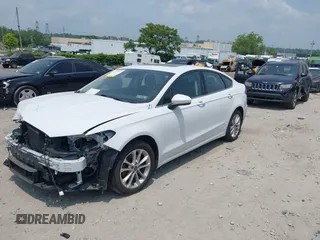 2020 Ford Fusion SE with VIN 3FA6P0LUXLR155881, listed as a IAAI auction lot 42426199 with 103,809 mi miles and . Bid and sale history available at DreamBid. Image 18.