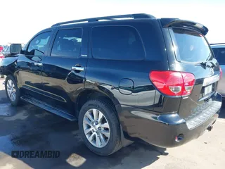 2014 Toyota Sequoia Limited with VIN 5TDKY5G13ES055656, listed as a IAAI auction lot 41616322 with 118,859 mi miles. Bid and sale history available at carsss.com. Image 3.