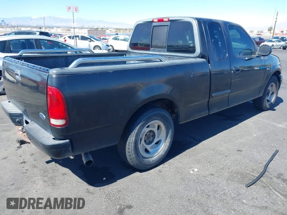 1999 Ford F-150 with VIN 1FTRX17W5XKB46900, listed as a IAAI auction lot 41792177 with Not provided miles and . Bid and sale history available at DreamBid. Image 4.