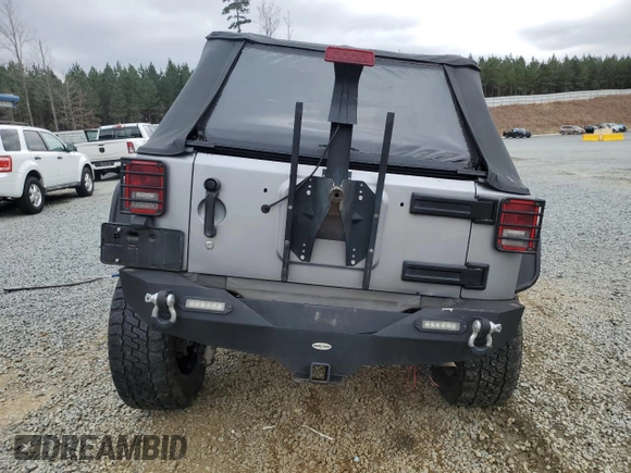 2014 Jeep Wrangler Unlimited Rubicon with VIN 1C4BJWFG7EL197252, listed as a Copart auction lot 44798205 with 115,778 mi miles and Salvage Title. Bid and sale history available at carsss.com. Image 6.