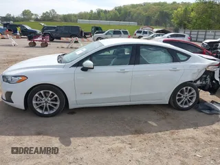 2019 Ford Fusion Hybrid SE with VIN 3FA6P0LU6KR267365, listed as a IAAI auction lot 42030525 with 95,401 mi miles. Bid and sale history available at carsss.com. Image 14.