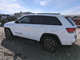 2021 Jeep Grand Cherokee Trailhawk with VIN 1C4RJFLG4MC703945, listed as a Copart auction lot 50703085 with 57,109 mi miles and Salvage Title. Bid and sale history available at carsss.com. Image 2.