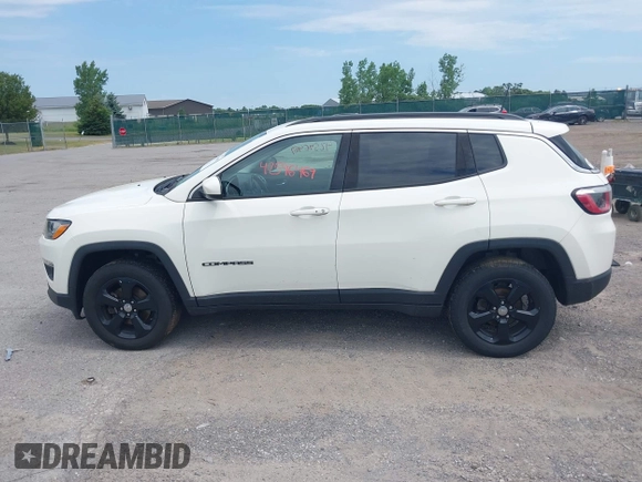 2019 Jeep Compass Latitude with VIN 3C4NJDBB8KT684116, listed as a IAAI auction lot 42596469 with 73,219 mi miles and . Bid and sale history available at DreamBid. Image 14.