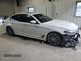 2018 BMW 5 Series 540i xDrive with VIN WBAJE7C53JWC54662, listed as a Copart auction lot 63703595 with 96,523 mi miles and Salvage title. Bid and sale history available at DreamBid. Image 4.