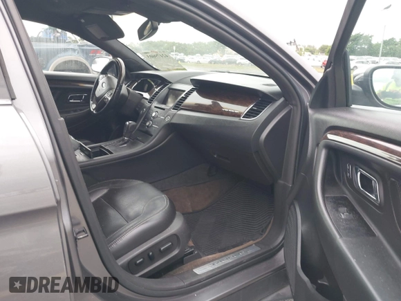 2014 Ford Taurus Limited with VIN 1FAHP2F8XEG115507, listed as a IAAI auction lot 42479603 with 160,986 mi miles and . Bid and sale history available at DreamBid. Image 5.