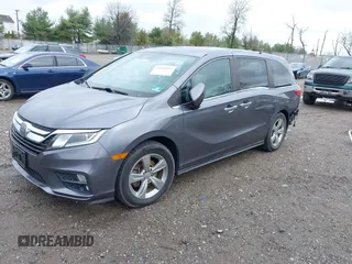 2018 Honda Odyssey EX-L z VIN 5FNRL6H70JB025227, wystawiony jako IAAI lot #41940992 z przebiegiem 95 797 mil mil oraz . Historia ofert i sprzedaży dostępna na DreamBid. Obrazek 2.