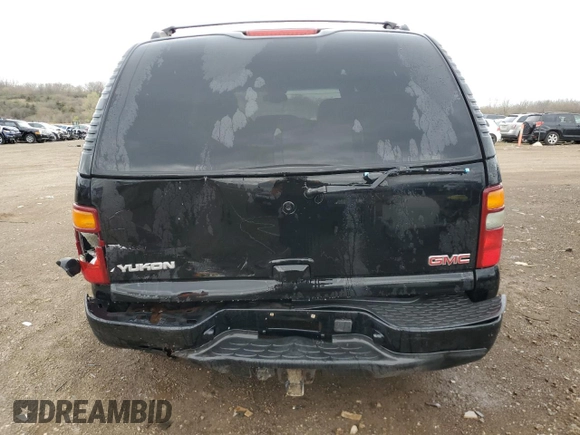 2003 GMC Yukon Denali z VIN 1GKEK63U43J263449, wystawiony jako Copart lot #53848345 z przebiegiem 144 280 mil mil oraz Szkody całkowita. Historia ofert i sprzedaży dostępna na DreamBid. Obrazek 6.