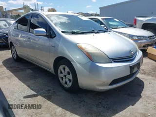 2007 Toyota Prius z VIN JTDKB20U473287224, wystawiony jako IAAI lot #42249014 z przebiegiem 248 372 mil mil oraz . Historia ofert i sprzedaży dostępna na DreamBid. Obrazek 1.