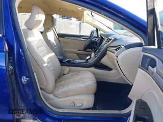 2016 Ford Fusion SE Hybrid with VIN 3FA6P0LU0GR388187, listed as a IAAI auction lot 38604646 with 135,625 mi miles. Bid and sale history available at carsss.com. Image 5.