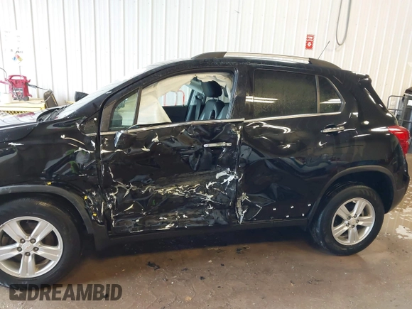 2020 Chevrolet Trax LT z VIN KL7CJPSB5LB059911, wystawiony jako IAAI lot #41660488 z przebiegiem 62 995 mil mil oraz . Historia ofert i sprzedaży dostępna na DreamBid. Obrazek 14.