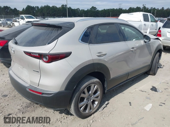 2023 Mazda CX-30 S Select with VIN 3MVDMBBM6PM518380, listed as a IAAI auction lot 40720006 with 13,422 mi miles and . Bid and sale history available at DreamBid. Image 4.