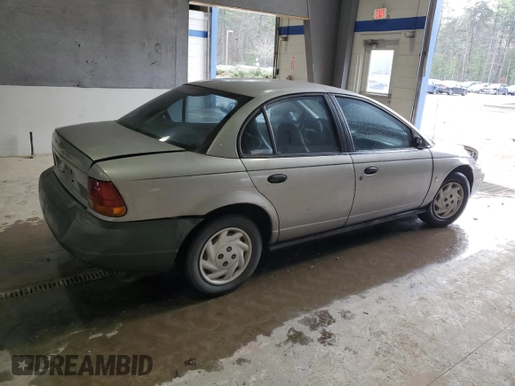 1998 Saturn SL with VIN 1G8ZF5285WZ204569, listed as a Copart auction lot 43624765 with 318,544 mi miles and Salvage Title. Bid and sale history available at carsss.com. Image 3.