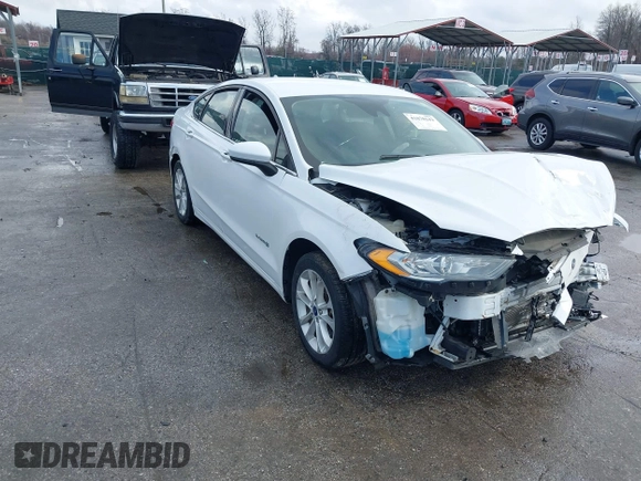 2019 Ford Fusion Hybrid SE with VIN 3FA6P0LUXKR104850, listed as a IAAI auction lot 41870242 with 114,943 mi miles. Bid and sale history available at carsss.com. Image 1.