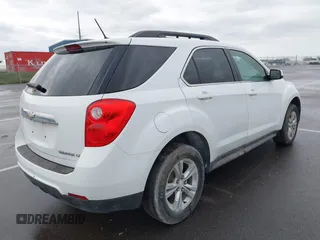 2014 Chevrolet Equinox LT z VIN 1GNALBEK2EZ138070, wystawiony jako IAAI lot #42091423 z przebiegiem 138 157 mil mil oraz . Historia ofert i sprzedaży dostępna na DreamBid. Obrazek 4.