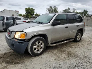 2005 GMC Envoy SLT with VIN 1GKDS13S352101385, listed as a Copart auction lot 89271025 with 165,670 mi miles and Salvage Title. Bid and sale history available at carsss.com. Image 1.