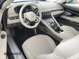 2025 Aston Martin DB12 z VIN SCFRMFFW4SGL15065, wystawiony jako Copart lot #74953394 z przebiegiem Nie podano mil oraz Nie do naprawy. Historia ofert i sprzedaży dostępna na DreamBid. Obrazek 8.