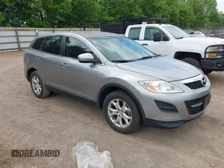 2012 Mazda CX-9 Touring with VIN JM3TB2CV6C0343840, listed as a IAAI auction lot 42221257 with 148,409 mi miles and . Bid and sale history available at carsss.com. Image 1.