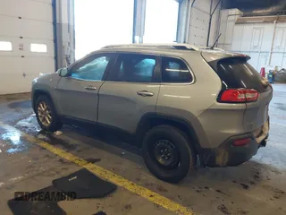 2015 Jeep Cherokee Latitude with VIN 1C4PJMCS5FW510298, listed as a IAAI auction lot 41518453 with 99,568 mi miles and . Bid and sale history available at DreamBid. Image 3.