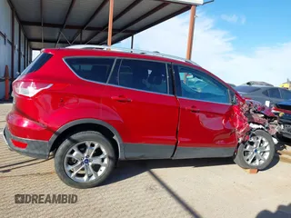 2014 Ford Escape Titanium с VIN 1FMCU0J91EUC20936, выставлен на аукционе IAAI как лот 41626264 с пробегом 27 089 миль миль и . История ставок и продаж доступна на DreamBid. Изображение 13.