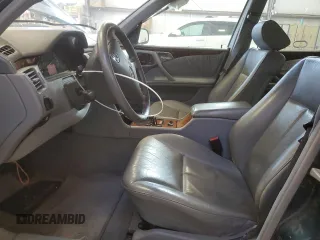 2000 Mercedes-Benz E-Class AWD with VIN WDBJF82G4YX027683, listed as a Copart auction lot 77146524 with 228,654 mi miles and Clean Title. Bid and sale history available at carsss.com. Image 7.
