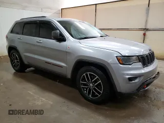 2017 Jeep Grand Cherokee Trailhawk with VIN 1C4RJFLG8HC618709, listed as a Copart auction lot 52899194 with 69,000 mi miles and Salvage title. Bid and sale history available at DreamBid. Image 4.