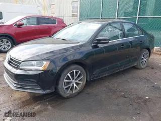 2018 Volkswagen Jetta 1.4T SE with VIN 3VWDB7AJ8JM240887, listed as a IAAI auction lot 40657661 with 76,568 mi miles. Bid and sale history available at carsss.com. Image 2.