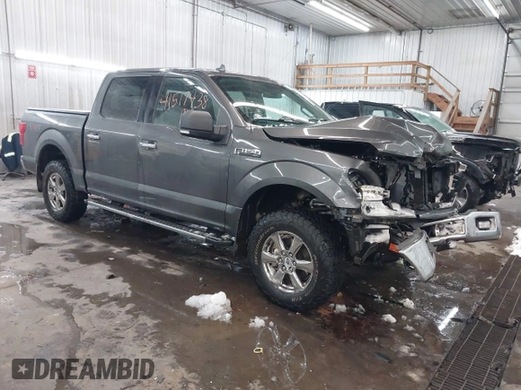 2018 Ford F-150 XL with VIN 1FTEW1E53JKF58493, listed as a IAAI auction lot 41517438 with 159,483 mi miles. Bid and sale history available at carsss.com. Image 1.