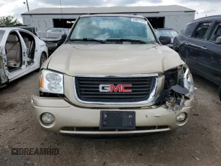 2004 GMC Envoy SLT with VIN 1GKDT13S142425057, listed as a Copart auction lot 69037524 with 231,483 mi miles and Salvage Title. Bid and sale history available at carsss.com. Image 5.