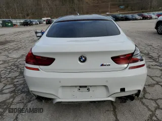 2015 BMW M6 z VIN WBS6C9C58FD467982, wystawiony jako Copart lot #78689983 z przebiegiem Nie podano mil oraz Szkody całkowita. Historia ofert i sprzedaży dostępna na DreamBid. Obrazek 6.