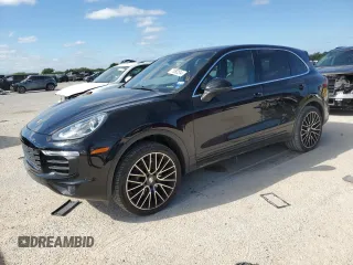 2018 Porsche Cayenne with VIN WP1AA2A27JKA04421, listed as a Copart auction lot 71092514 with 57,295 mi miles and Salvage title. Bid and sale history available at DreamBid. Image 1.