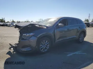 2019 Mazda CX-9 Sport с VIN JM3TCABY6K0320091, выставлен на аукционе Copart как лот 79287894 с пробегом 93 156 миль миль и Списание • Salvage title. История ставок и продаж доступна на DreamBid. Изображение 1.